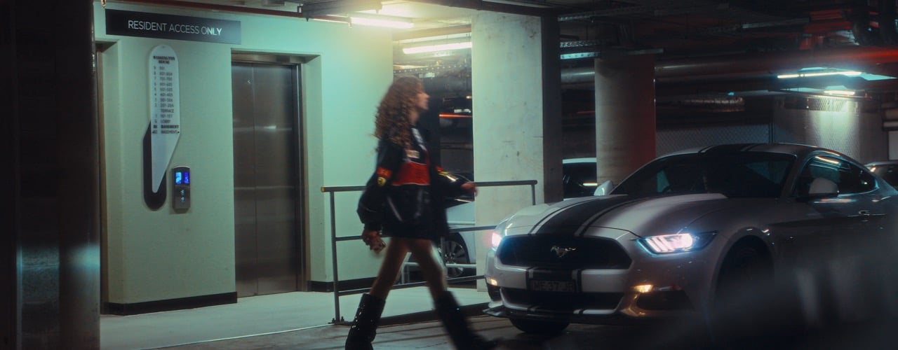 Girl getting into Car - The Reckless Driver music video frame featuring Laila Michelini - By Joel Black of Tommirock