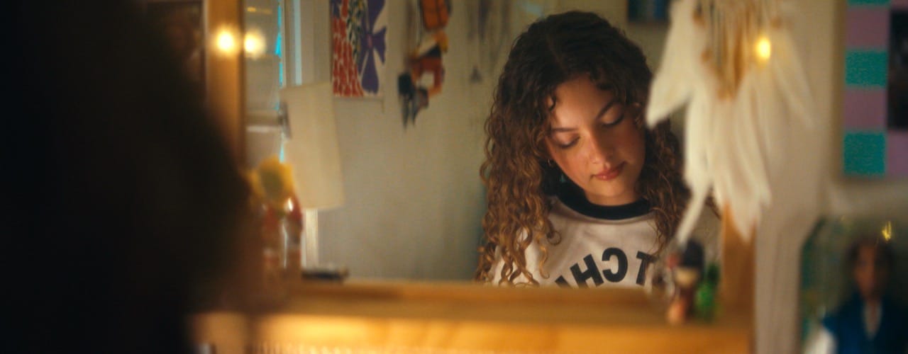 Girl getting ready in mirror - The Reckless Driver music video frame featuring Laila Michelini - By Joel Black of Tommirock