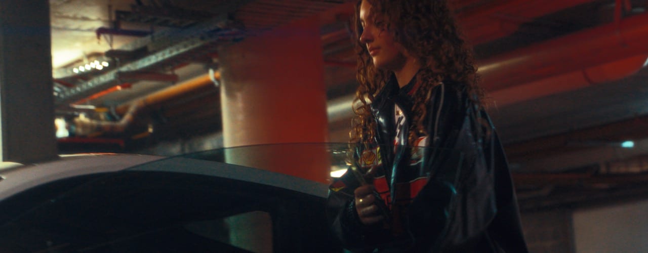 Girl getting into Car - The Reckless Driver music video frame featuring Laila Michelini - By Joel Black of Tommirock