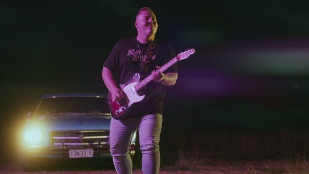 Jake Davey performing in the Admire You Music Video