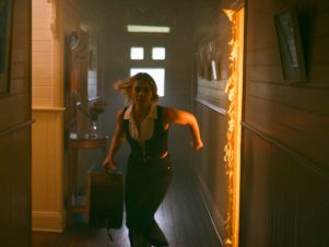 Hudson Rose runs from the fire in the building - Music video by Joel Black