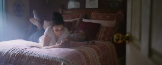 Girl laying on Bed