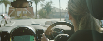 Girl driving Mini