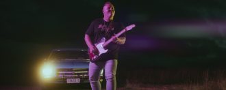 Jake Davey performing in the Admire You Music Video