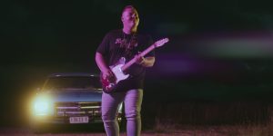 Jake Davey performing in the Admire You Music Video