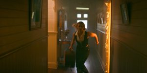 Hudson Rose runs from the fire in the building - Music video by Joel Black
