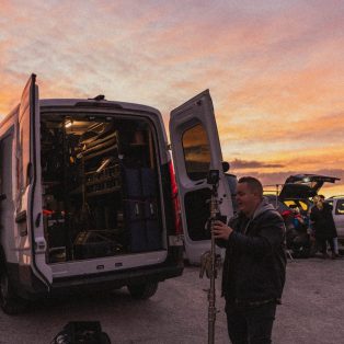 Video Production team on set for a music video for Restless road with Director / DoP Joel Black restless road BTS Tommirock Grip truck